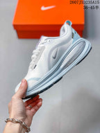 Side view highlighting the mesh-like upper, Nike branding, and layered midsole.