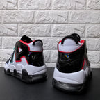 Rear view showing the black heel panels, white collars, and visible heel air units