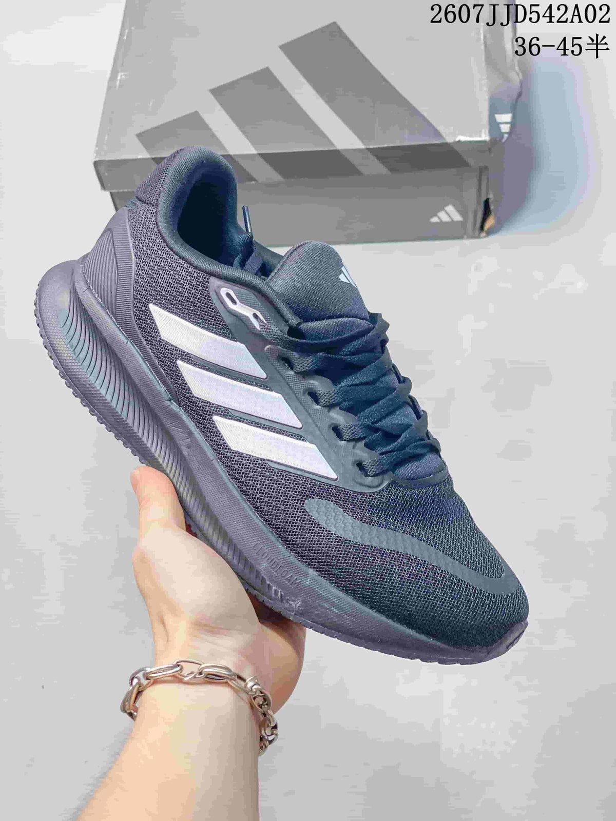 Gray adidas Runfalcon 5 shoe with light-colored side stripes and a dark sole.