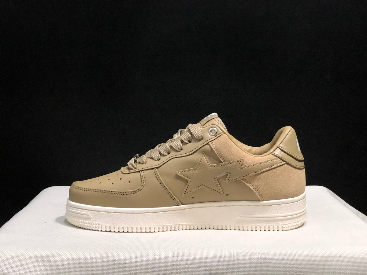 Side profile highlighting the low-top silhouette, stitched panels and white platform-style sole.