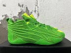 Side profile showing the openwork cage design on green Adidas sneakers