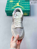 Front view showing the perforated toe, white laces and tongue logo