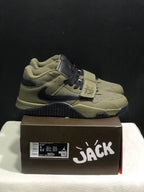 Side view of the olive and black sneaker pair resting on a branded Jumpman Jack box.