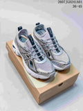 Pair of silver-toned ASICS GT-2160 Breeze sneakers on a shoebox; image shows the size range 36–45.