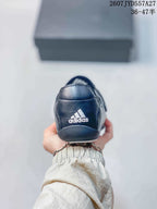 Rear view showing the adidas logo on the black heel