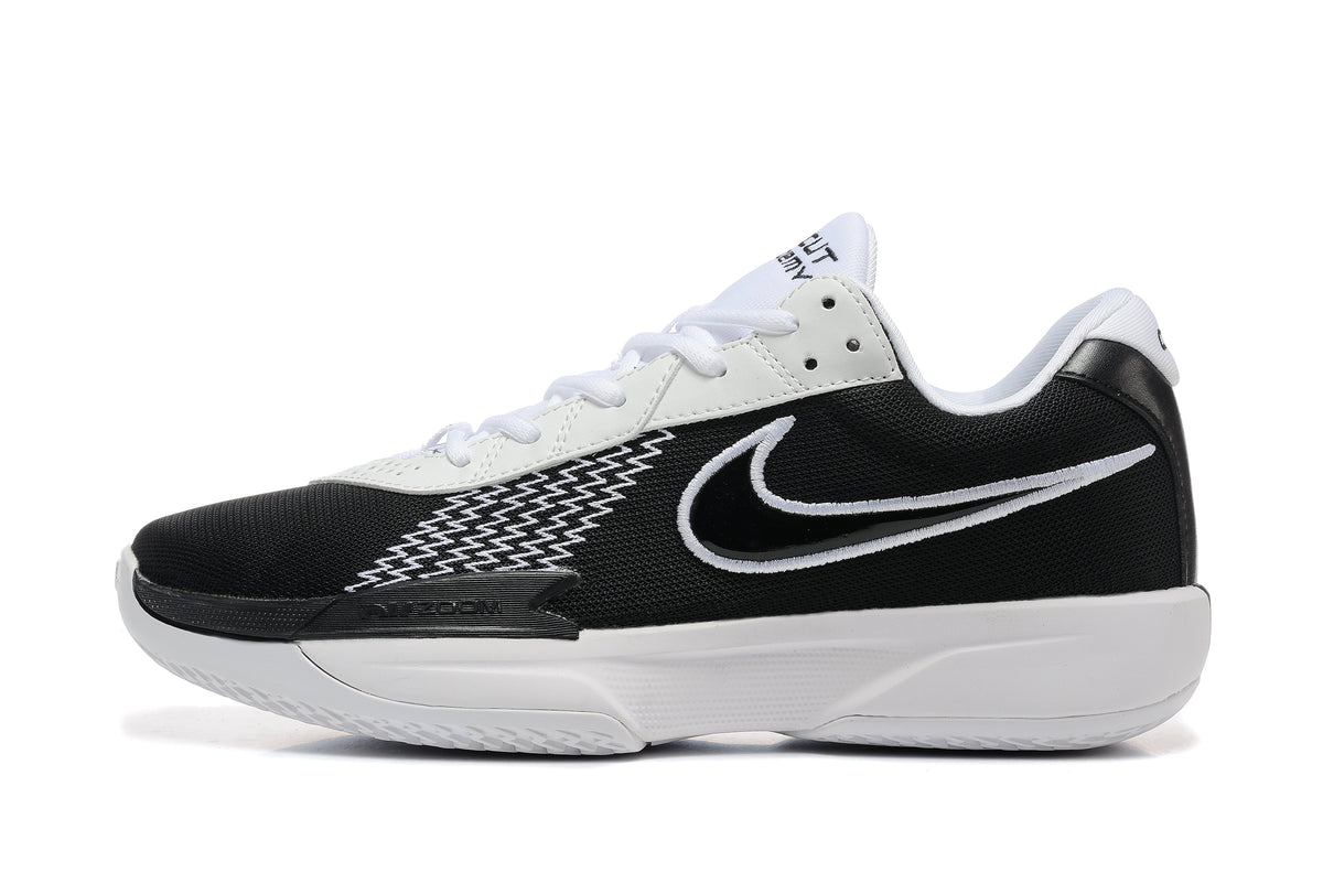 Side profile of a black and white Nike G.T. Cut Academy basketball shoe.