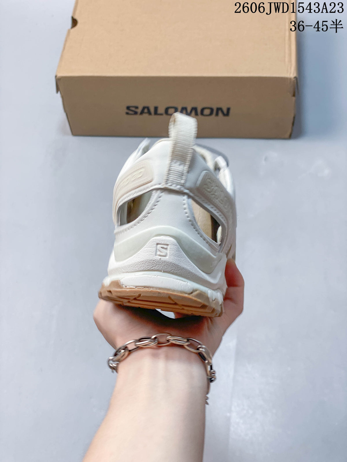 Rear view showing the heel pull tab and outsole