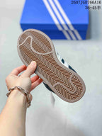 Close-up of the textured rubber outsole with a zigzag tread pattern.