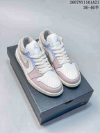 Pair of white, pink and light blue low-top Jordan sneakers displayed on a shoebox; image text shows style code 2607NY1161A21 and size range 36–46.5.