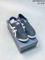 Black and white Onitsuka Tiger sneakers displayed on a shoebox, with product code and size range visible above.