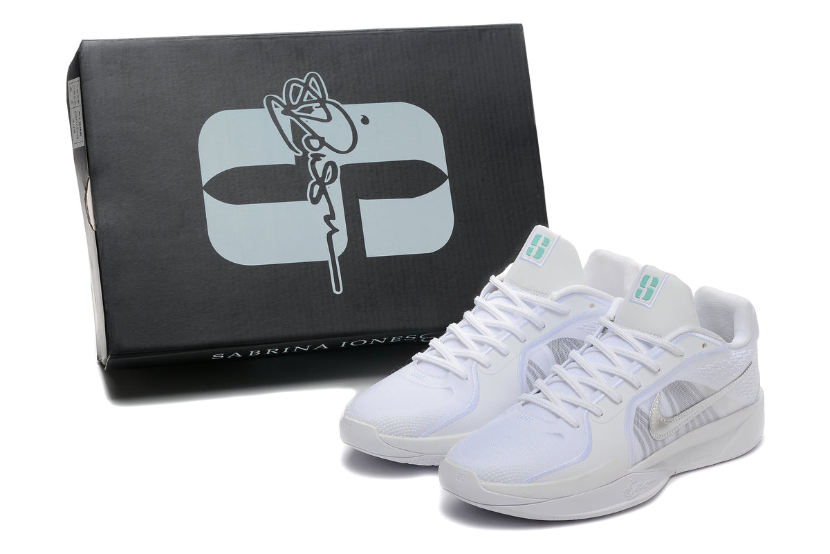 White basketball shoes beside a black box marked Sabrina Ionescu.