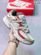 White Nike V5 RNR sneaker with red and beige accent panels.