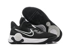 Black basketball shoe with white Swoosh, white midsole, and black and white outsole.