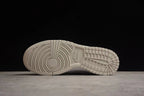 Bottom view showing the patterned rubber outsole with circular forefoot and block heel tread.