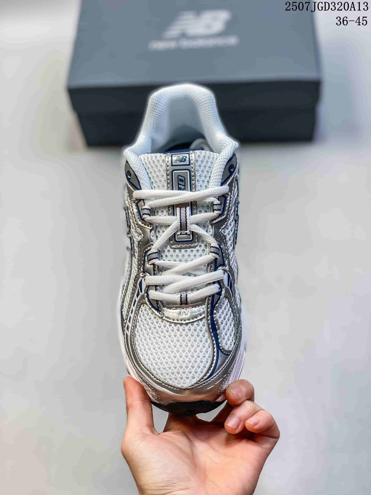 Top view showing the white laces, padded tongue, and textured forefoot panel.