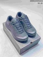 Pair of dark gray Arc'teryx-labeled low-cut hiking shoes on a box; image overlay shows sizes 39–45.