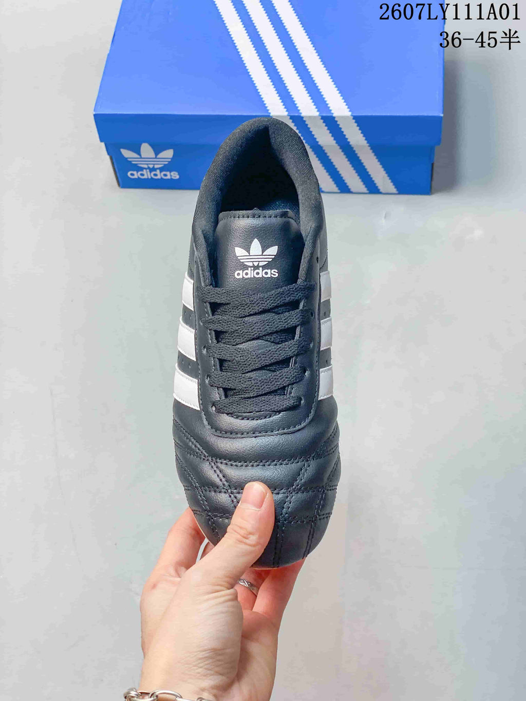 Top view showing the laces, tongue logo and quilted toe