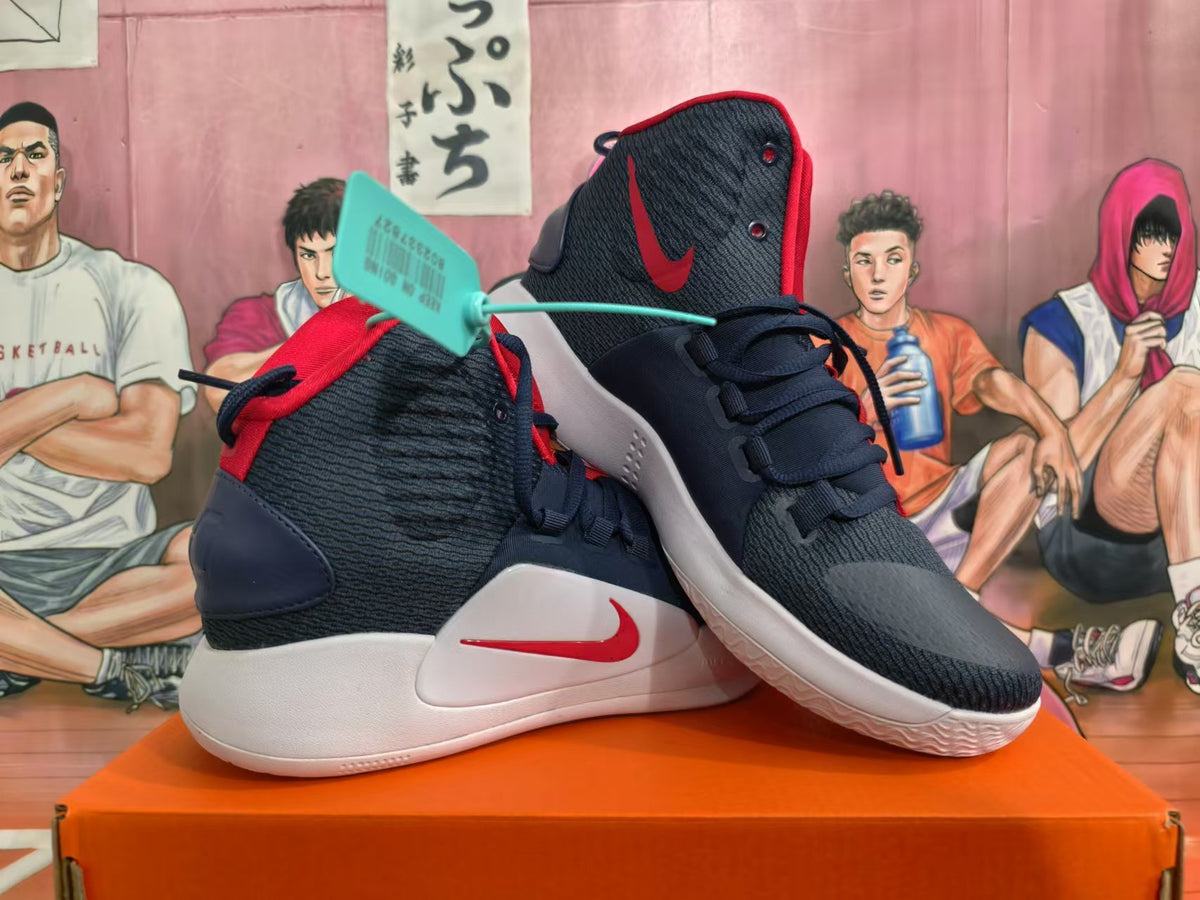 Pair of navy and red Nike basketball shoes displayed together