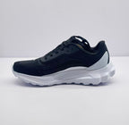 Opposite side view showing the black upper, layered side detailing, and white sole.