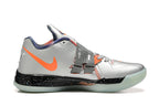 Side view of a silver-gray Nike KD 4 shoe with an orange-accented strap and pale outsole.