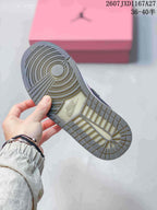 Outsole view showing the circular traction pattern and textured rubber tread.
