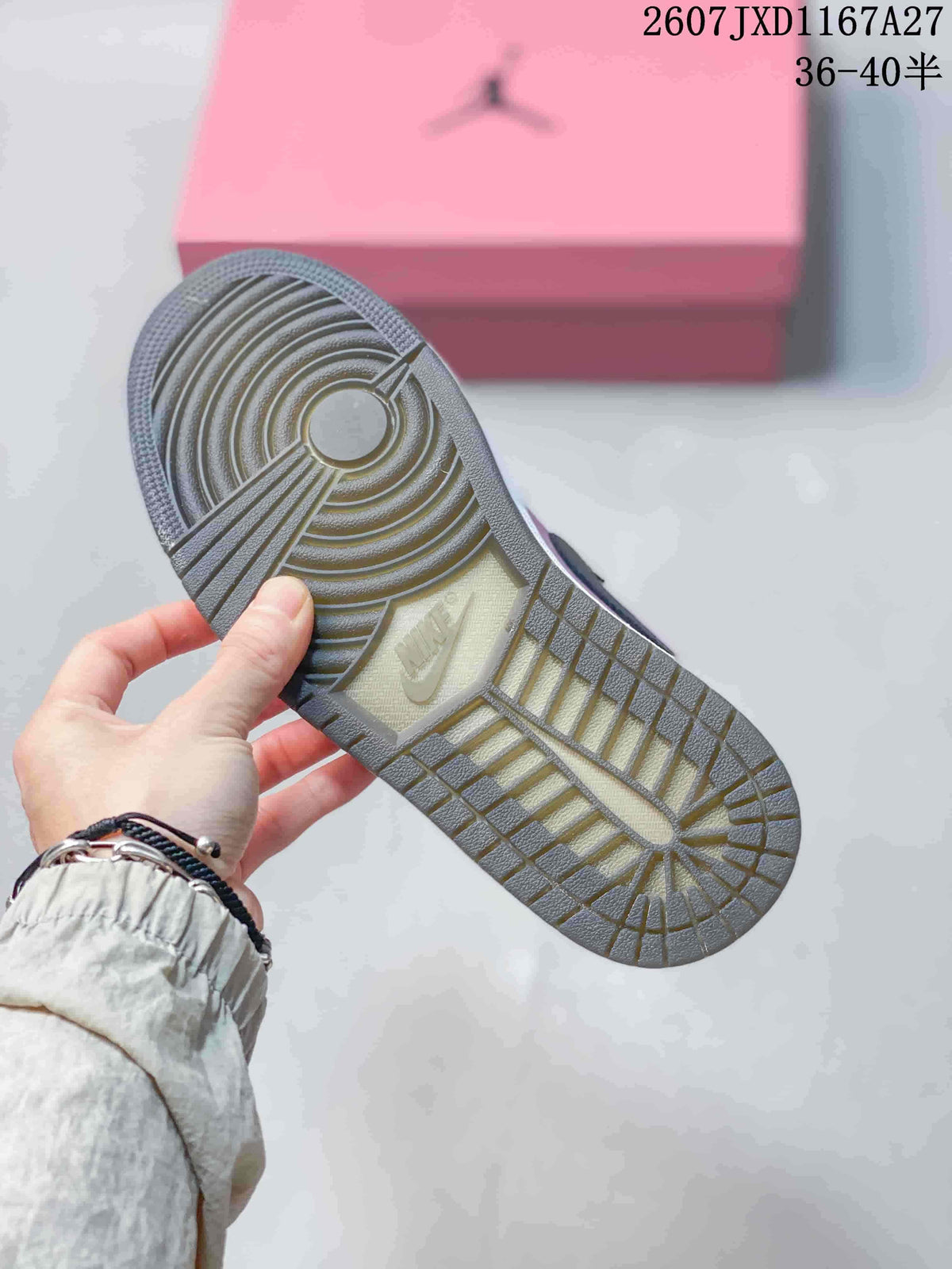 Outsole view showing the circular traction pattern and textured rubber tread.