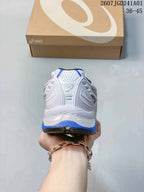 Rear view of the white sneaker with blue heel accents