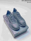 Pair of dark gray ECCO mesh-style sneakers displayed on an ECCO shoe box; style code 2607JWD846A26 and size range 38–45 are visible.