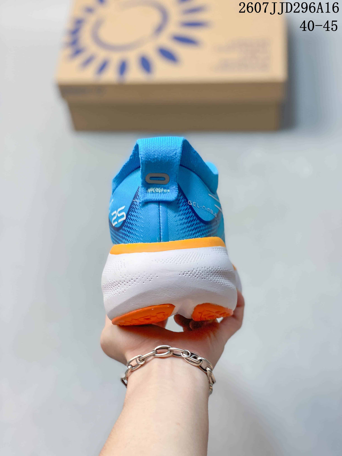 Rear view of a blue ASICS GEL-Nimbus 25 running shoe showing the heel pull tab, padded collar, white midsole, and orange outsole.