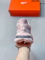 Rear view showing the padded heel, Nike branding and visible midsole air unit.