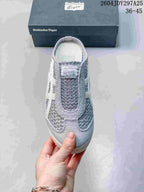 Top view showing the textured toe box, tongue label, and slip-on opening.
