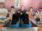 Front view of black Nike GT Cut 3 basketball shoes with turquoise and blue accents