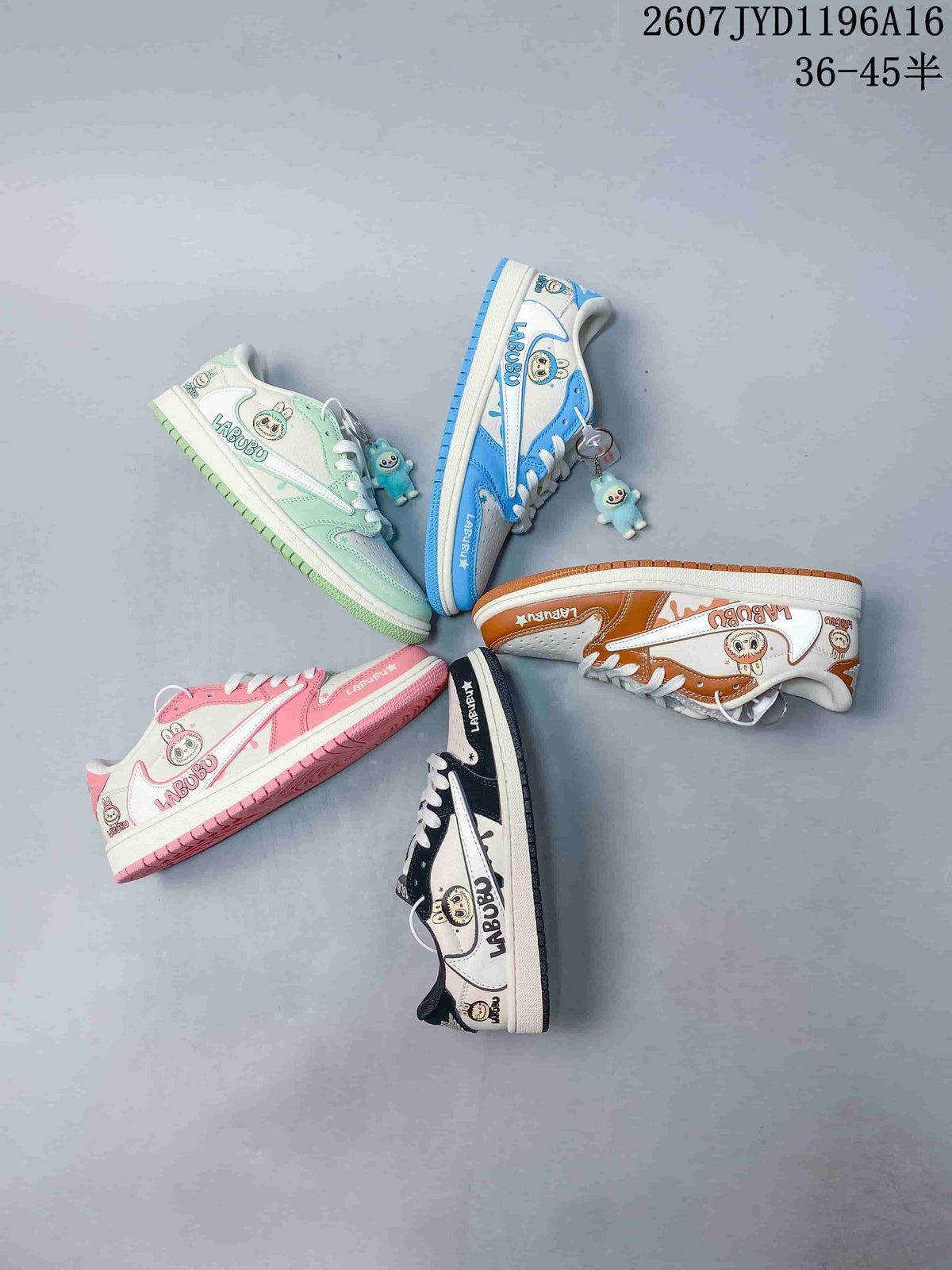 Five color options of the low-top sneakers arranged together, including blue, mint, brown, pink and black.