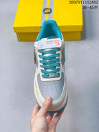 Top view showing perforated toe panel and turquoise laces
