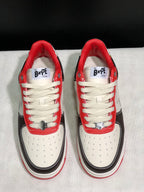 Front top view showing the lacing, perforated toe boxes, contrast black overlays, and BAPE STA tongue labels.