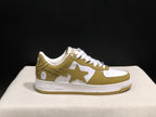 Single side profile of the olive and white sneaker showing the star panel, heel graphic, and BAPE-branded midsole.