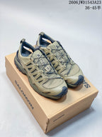 Olive-toned Salomon XA Pro 3D Amphib shoes shown on a branded box