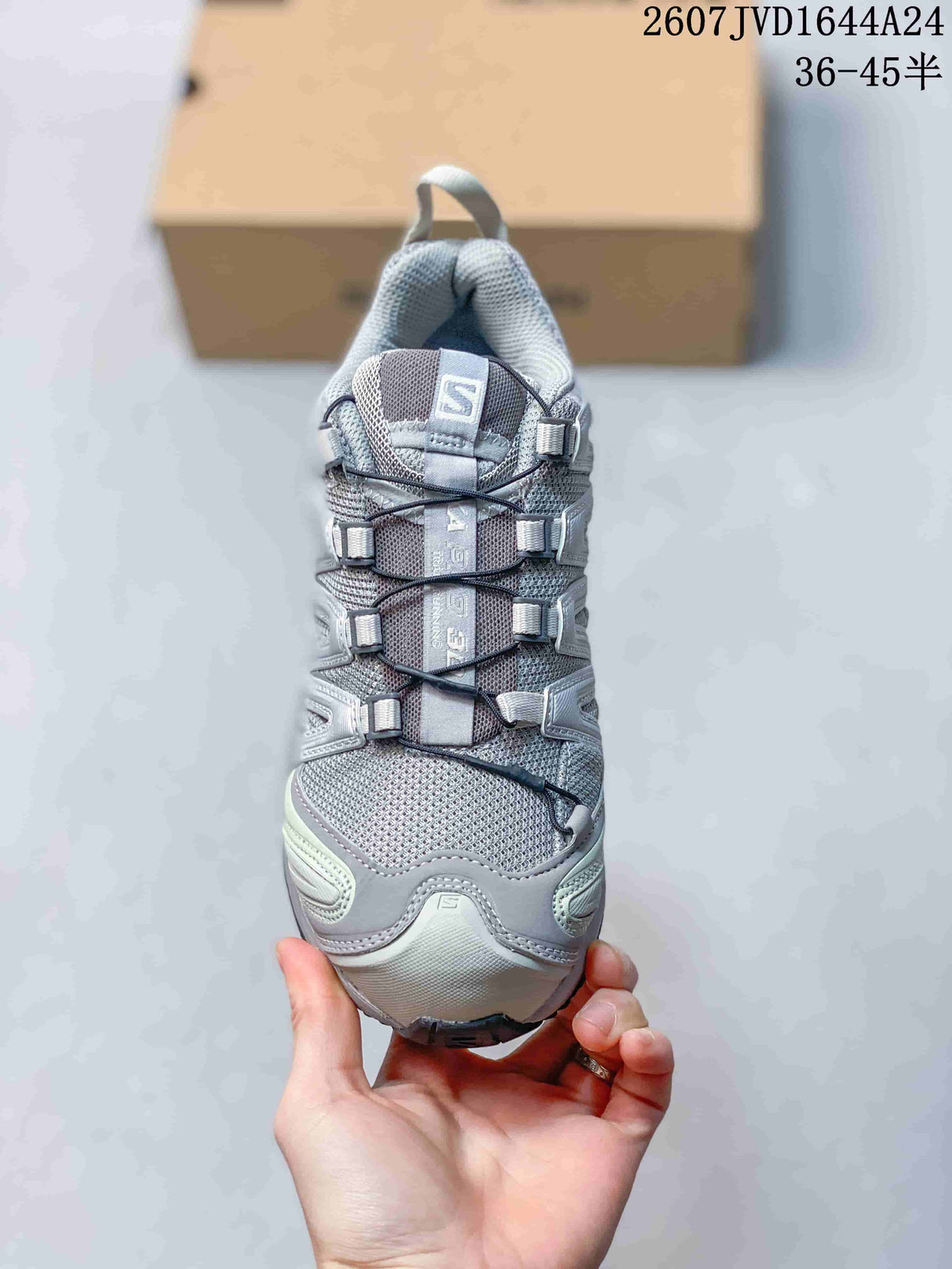 Top view showing the mesh-style tongue, lace system and Salomon branding.