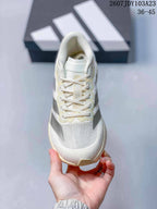 Top view showing the lace-up closure, padded tongue, textured toe area and adidas branding.