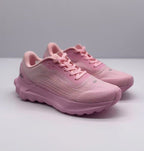 Three-quarter front view of a pair of pink Alo sneakers with lace-up fronts and textured uppers.