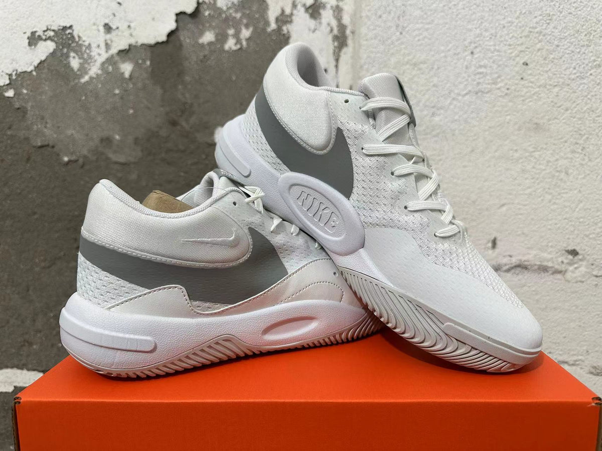 Pair of white and grey Nike Hyperquick low-top training shoes displayed together