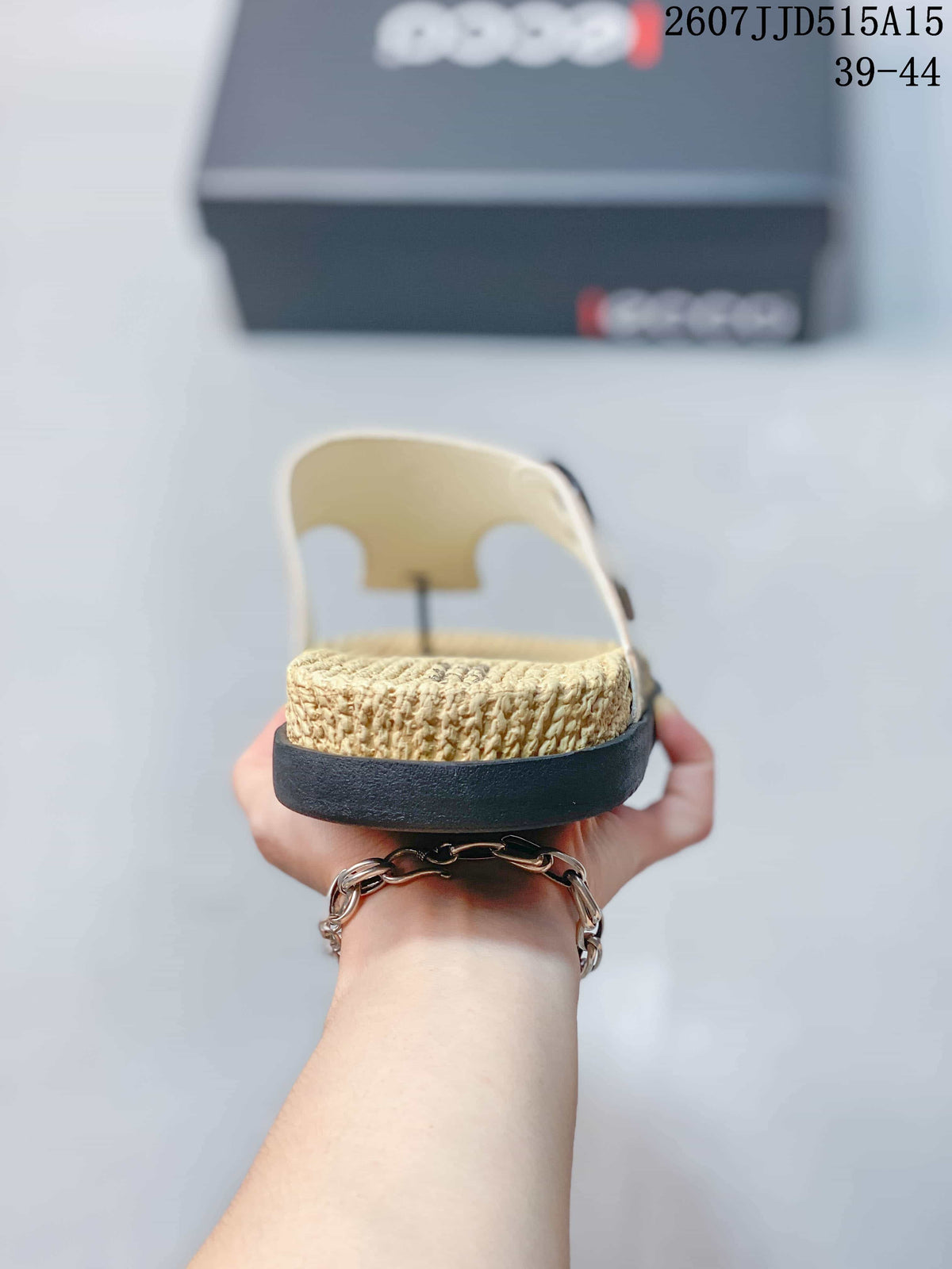 Front view showing the textured footbed, toe-post construction, and black outsole.
