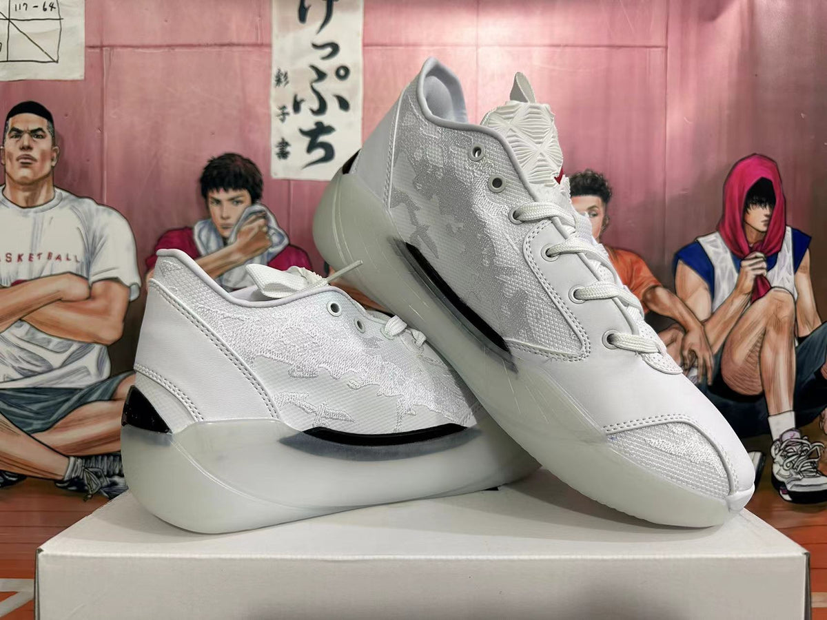 White basketball shoes shown from the side and at an angle