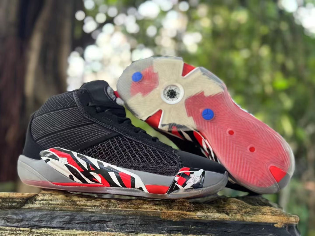 Jordan XXXVIII shoe beside a view of its translucent outsole