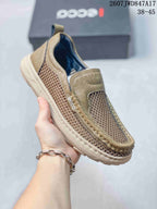 Close-up side view of a khaki ECCO slip-on shoe showing mesh panels, stitched detailing, pull tab and light outsole.