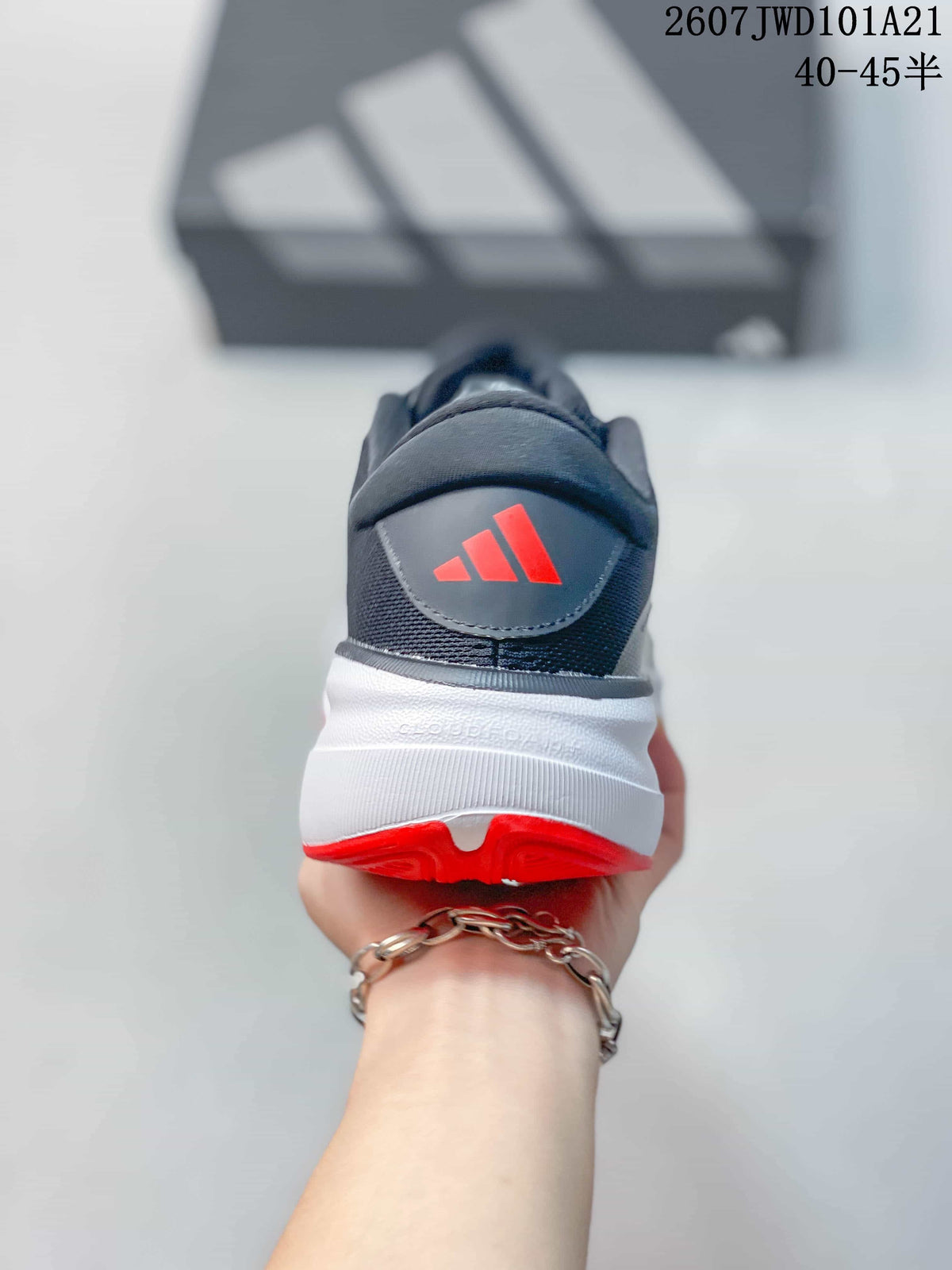 Rear view of the sneaker showing the red Adidas logo, padded collar, white midsole, and red outsole edge.