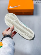 Close-up of the sneaker outsole showing a textured herringbone tread pattern.