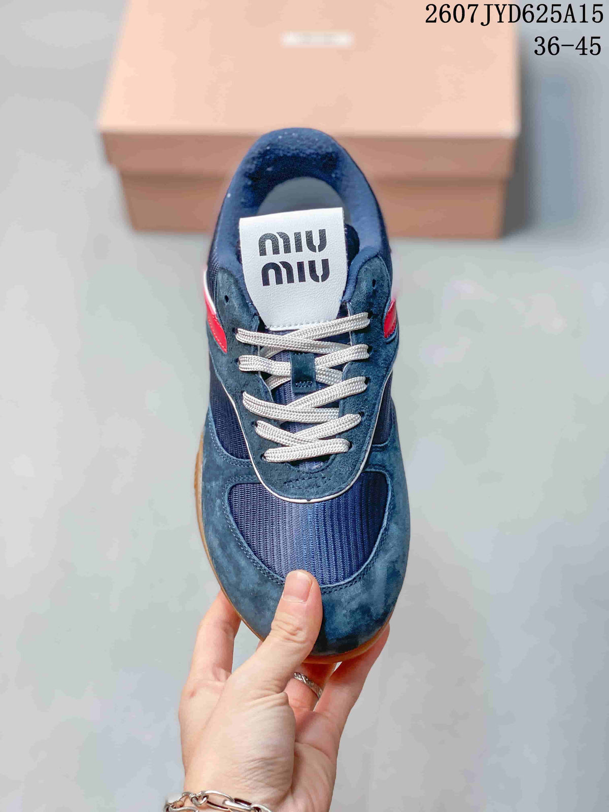 Top view of the navy sneaker showing contrast laces, textured panels, and the Miu Miu tongue label; image text lists sizes 36–45.