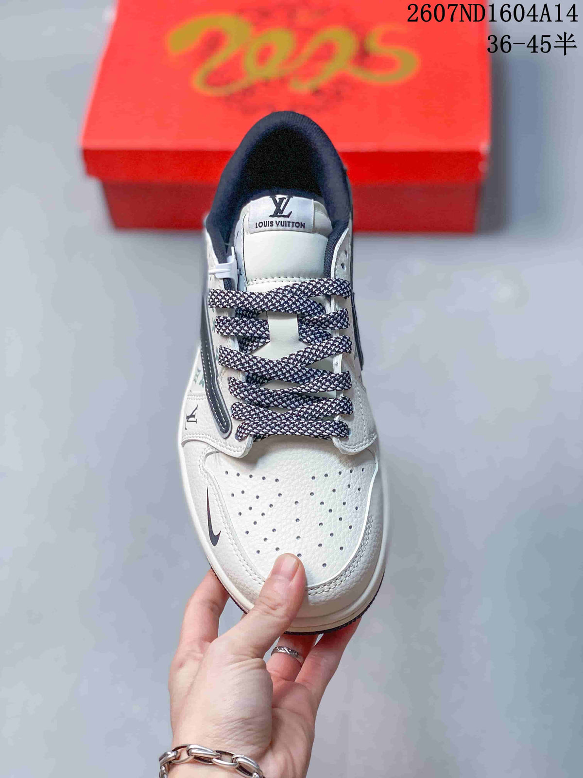 Top view showing the perforated white toe box, patterned laces, navy collar, and branded tongue.