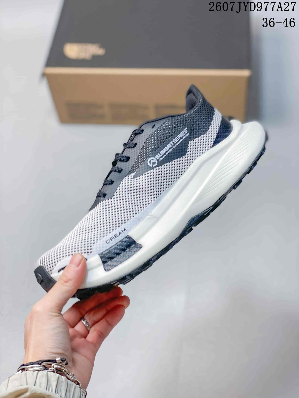Side profile showing the mesh upper, Summit Vectiv Pro branding, white midsole, and dark outsole.